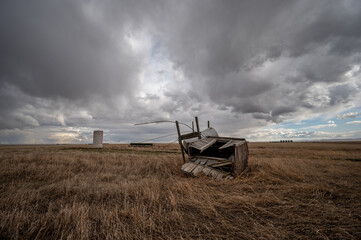 Abandoned farm buildings in Alberta in early Spring.