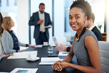 These presentations are always informative. Portrait of a young businesswoman working in the...
