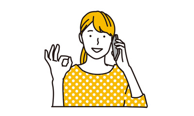 笑顔でOKサインをするアジア人女性