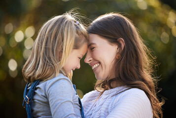 My love for you grows more and more each day. Shot of a mother and her little daughter bonding together outdoors.