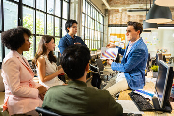 Group of young creative business brain storm meeting presentation,discussing roadmap to product launch, planning,strategy,new business development,working with new startup project in office.