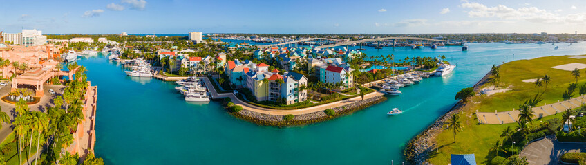Fototapeta na wymiar Harborside Villas aerial view and Paradise Island Bridge at Nassau Harbour, from Paradise Island, Bahamas.