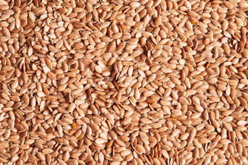 Flax seeds close-up. Macro photo. View from above. Flat lay.
