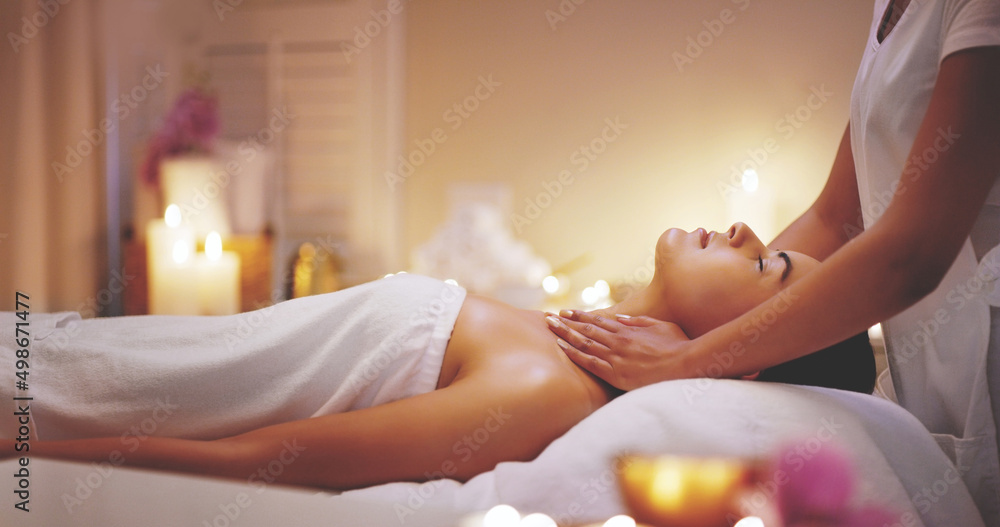 Canvas Prints Spoil and pamper yourself at every chance. Shot of a beautiful young woman enjoying a shoulder massage at a beauty spa.