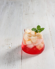 Es Timun suri is an Indonesian cold fruity drink with red coco pandanus syrup. Timun suri or cucurbitaceae is available during Ramadan for break fasting.