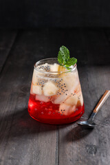 Es Timun suri is an Indonesian cold fruity drink with red coco pandanus syrup. Timun suri or cucurbitaceae is available during Ramadan for break fasting.