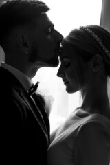 The newlyweds embrace in the room and spend time together