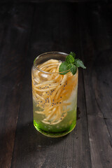Es Blewah. Indonesian cold fruity drink of cantaloupe strips with syrup, basil seeds on top;