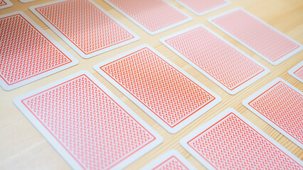 Playing cards lined up on the desk_31