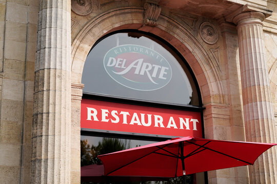 Pizza ristorante del arte brand text and logo sign on facade restaurant italian