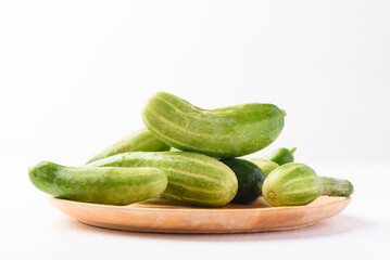 Fresh cucumber on white background