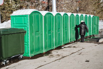 Toilet bio stands on the street, plastic city toilet for residents of a big city, mobile booths of...