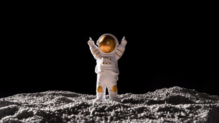 Spaceman stand on surface of alien planet.