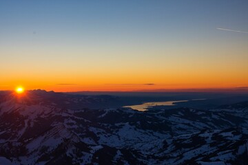 Sunset view from Santis peak mountain Switzerland. spectacular view, sunset. winter snow covered mountains