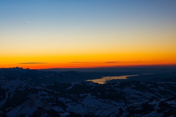 Fototapeta na wymiar Säntis peak mountain Switzerland. spectacular view, sunset. winter snow covered mountains. clear Sunset Santis peak mountain Switzerland. spectacular view, sunset.