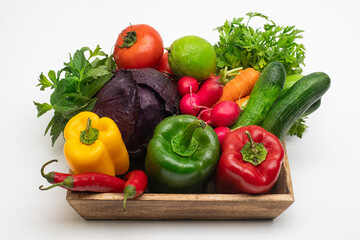 Fototapeta na wymiar organic food background Vegetables in the basket, Fresh vegetable basket on a white background 