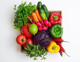 organic food background Vegetables in the basket, Fresh vegetable basket on a white background 
