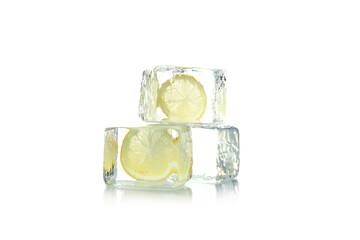 Ice forms with lemon slices isolated on white background
