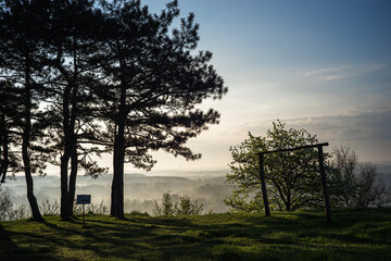 wooden arch gate hills green spring landscape