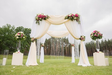 wedding square arch floristry for ceremony white fabric
