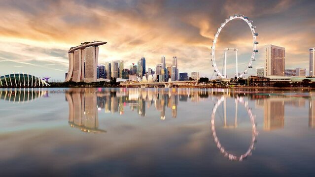 Time lapse of Singapore sunset city skyline at business district, Marina Bay