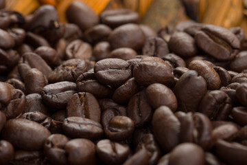 Close-up of a bunch of freshly roasted coffee beans 
