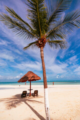 Cancun Mexico beautiful caribbean sea on a sunny day and cloudy sky. Sandy beach