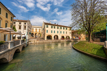 Cityscape of Treviso downtown with the river Sile with the street called Via Pescheria (fish market street and island). Veneto, Italy, Europe.