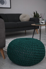 Stylish comfortable poufs in room. Home design