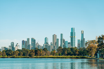 Fototapeta na wymiar Melbourne cityscape with skyscrapers, blue sky and Yarra River.