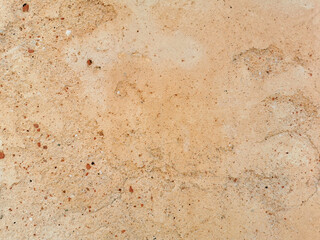 Old cracked vintage brown concrete wall texture background.