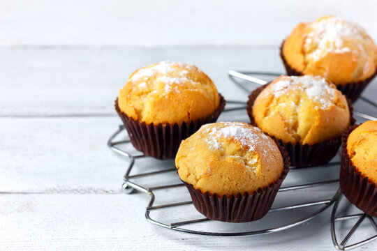 Vanilla Muffins On A Cooling Rack.