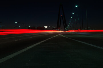 Fototapeta na wymiar Track from headlights of cars on the night highway.