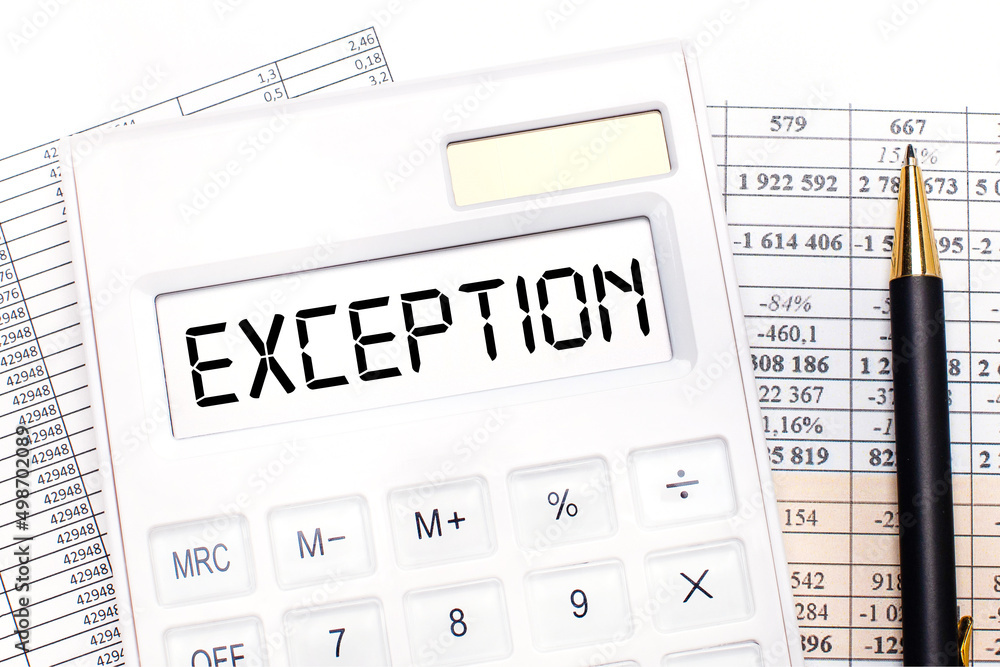 Poster on the desktop there are reports, a white calculator with the text exception on the scoreboard and a