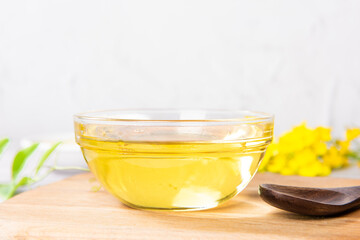cooking oil in glass bowl on table