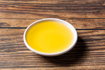 cooking oil in a plate on table