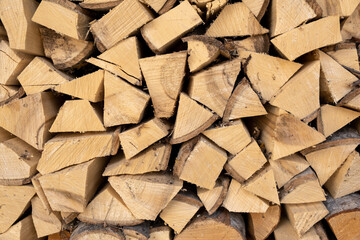 Stacked chopped fire wood texture background