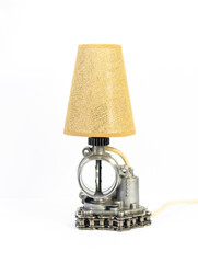 Modern table lamp with small lampshade isolated from car parts