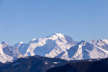Summit of Mont Blanc mountain in the Alps, popular for outdoor activities: hiking, climbing, trail running and winter sports