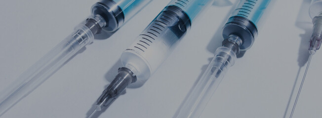 medical syringes on a white background