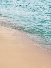 Fototapeta na wymiar Beach sand sea water summer background.