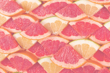 Pomelo and grapefruit slices background.