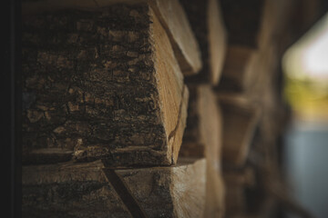 Firewood stacked on top of each other, wood texture, background for text, macro photography.