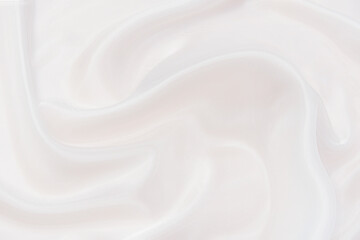 Abstract and soft focus wave of white or ivory fabric background, white ivory texture and detail