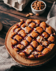 cherry pie on a wooden table