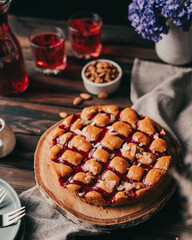 homemade cherry and almond pie on table