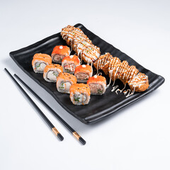 Japanese cuisine. Sushi set of nigiri and maki rolls served. Top view