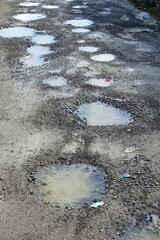 rough road, muddy deformed road, rain-destroyed roads,