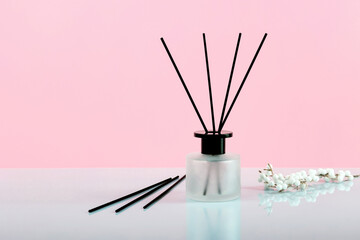 Aromatherapy and home perfume concept - aroma reed diffuse.