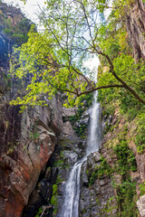 Waterfall among the rocks on a mountainside in the Serra do Cipo region of the Brazilian Cerrado (savanna) biome in Minas Gerais